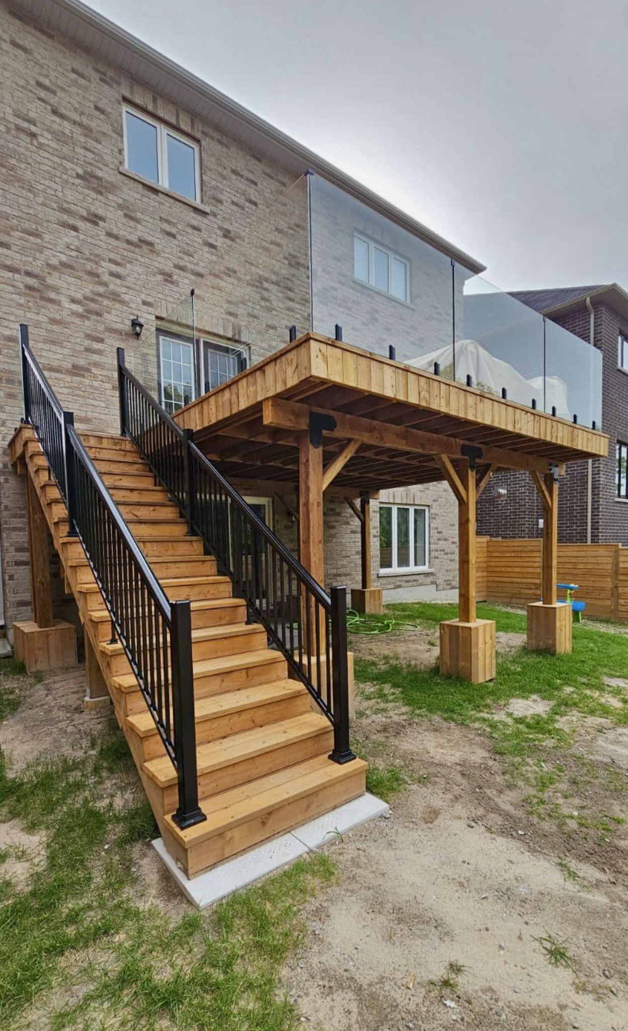Cedar Deck with Glass Railing and Pergola