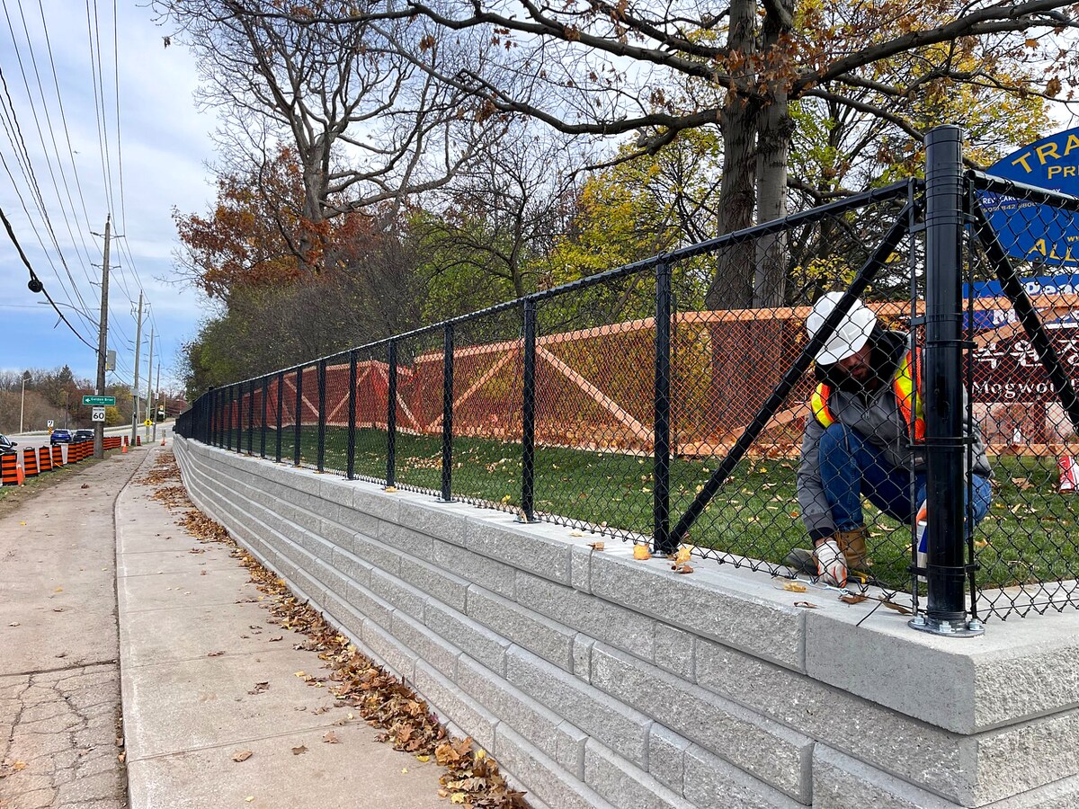 Chain Link Fence on Retaining Wall