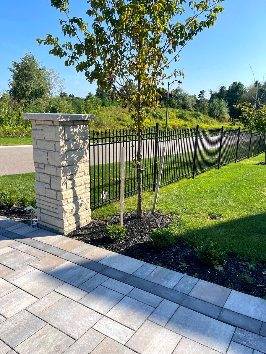 Aluminum Fence with Stone Pillar